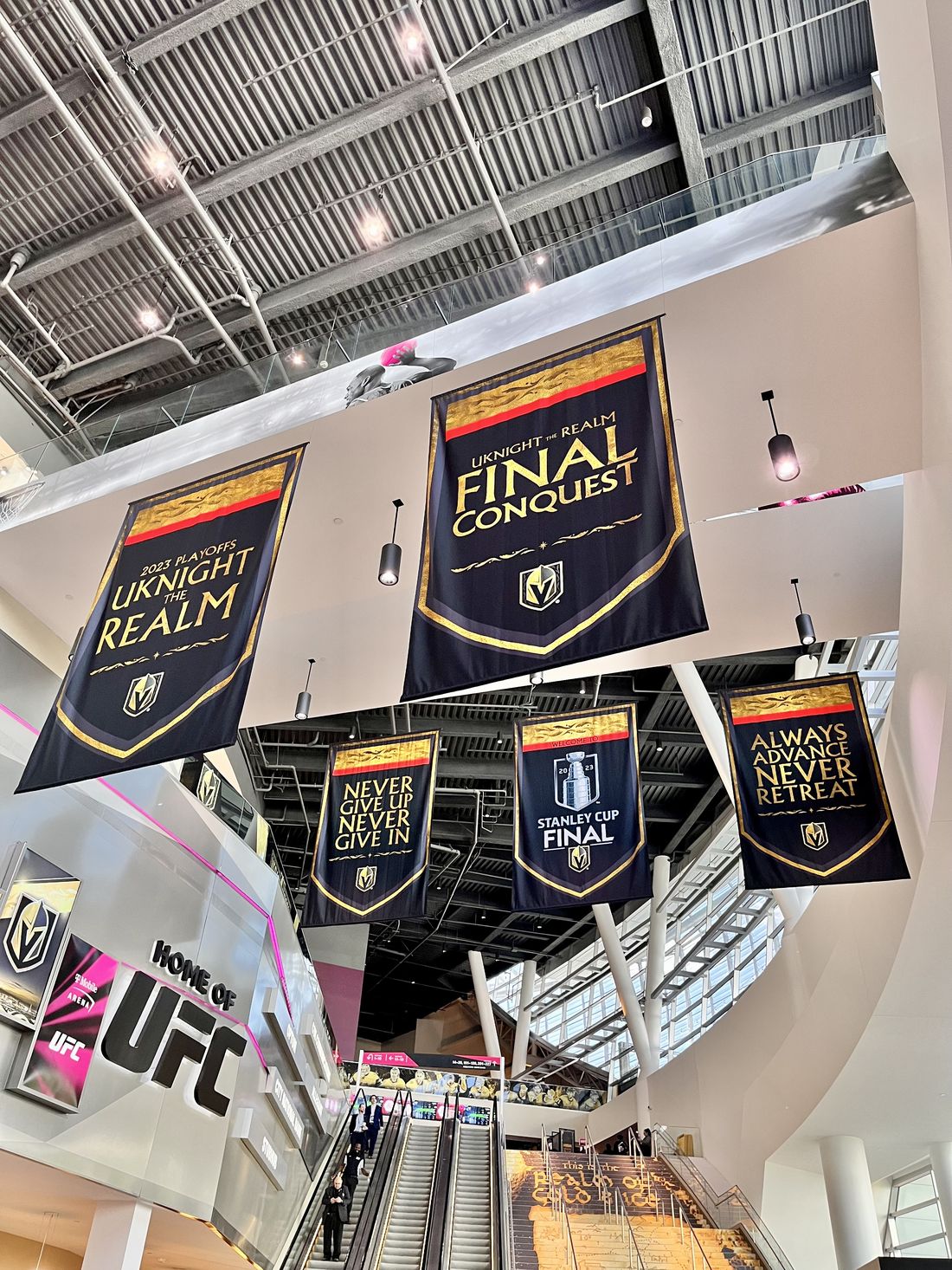 Vegas Golden Knights playoff banners above the T-Mobile Arena lobby.