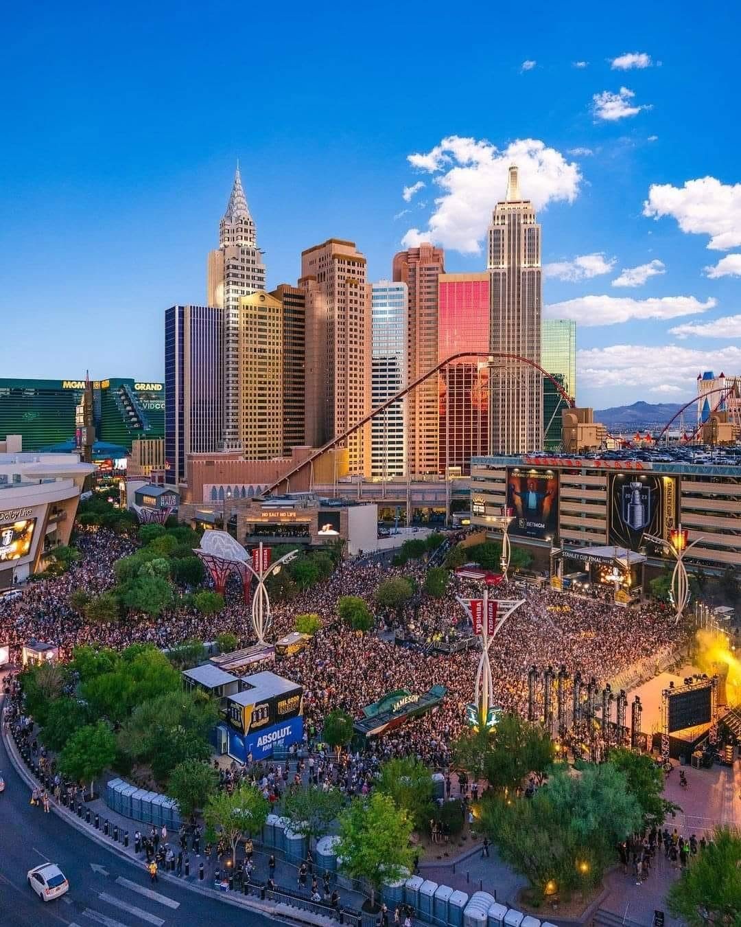 Aerial view of Toshiba Plaza packed with fans during the 2023 Stanley Cup Final, with partner banners across the plaza and garage.