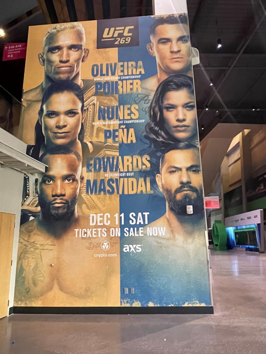 A UFC 269 fight wall on the T-Mobile Arena concourse.