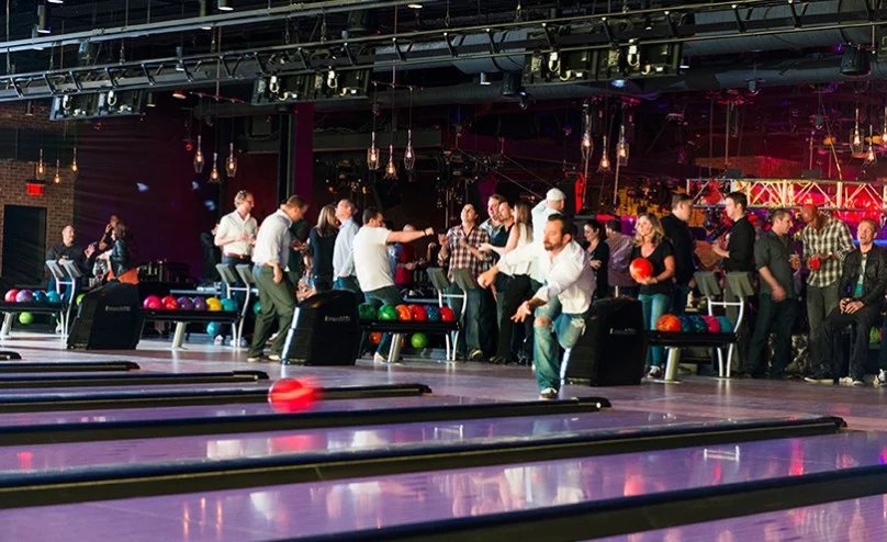 Guests bowling on the lanes at Brooklyn Bowl Las Vegas.