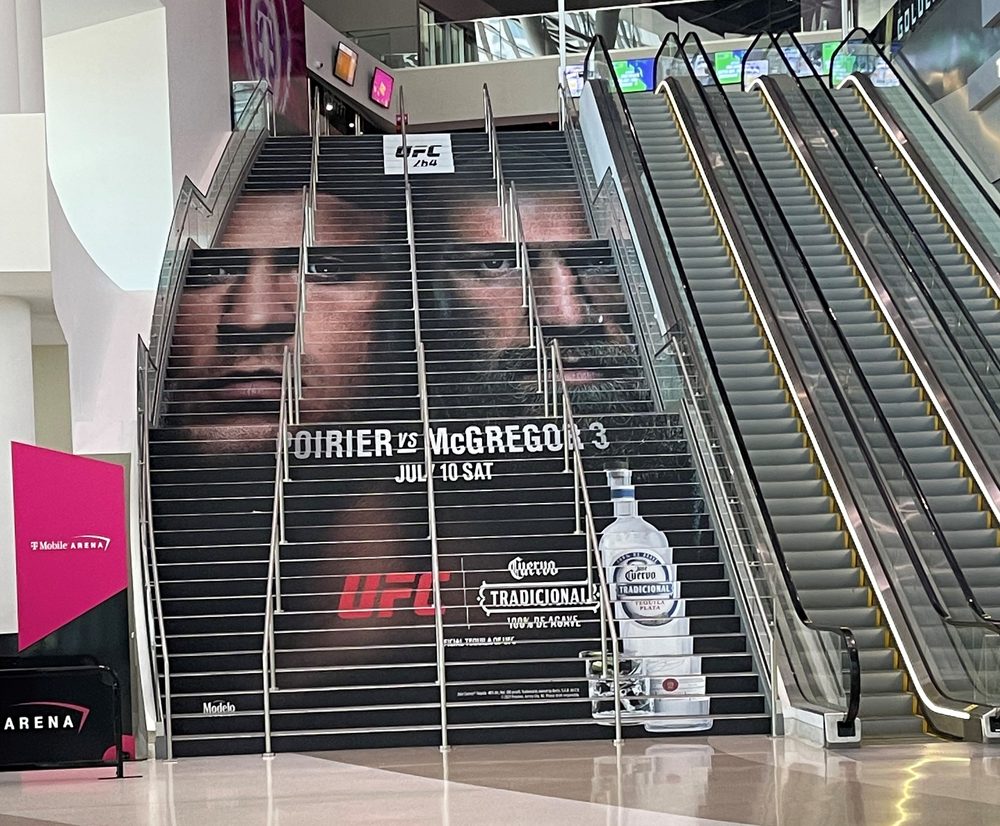 Lobby stairs wrapped for UFC 264 with Cuervo Tradicional branding.